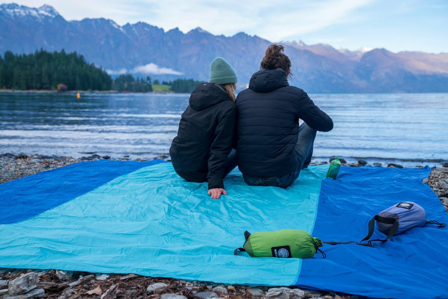 Oversized Sand-Free Beach Blanket – Waterproof Portable Picnic Mat with Stakes, Attached Storage Pouch, Lightweight Compact Outdoor Blanket for Beach, Camping, Hiking & Travel